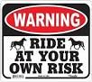 Warning Ride At Your Own Risk Sign